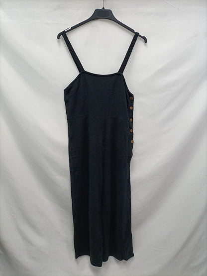 PULL&amp;BEAR. Black buttoned jumpsuit.