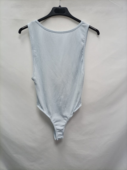 COLLUSION. Body celeste canalé T.38