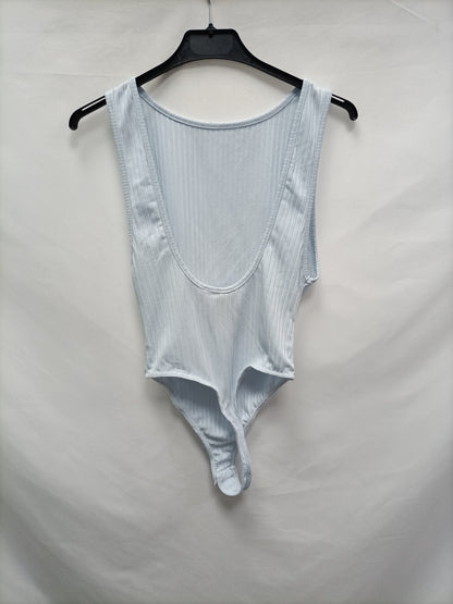 COLLUSION. Body celeste canalé T.38