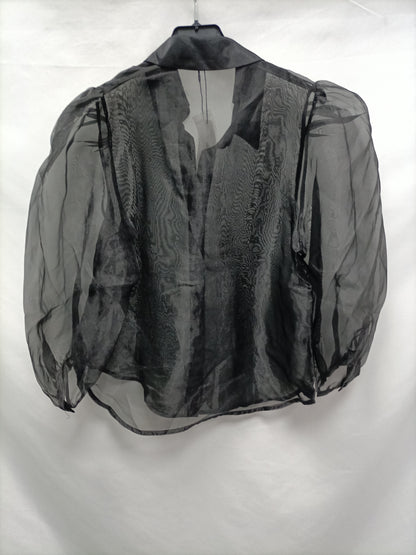 STRADIVARIUS. Blusa negra semitransparente T.m