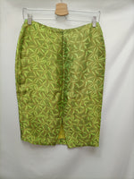 ROSA ROJAS. Total look falda chaqueta verde estampado hojas T.40
