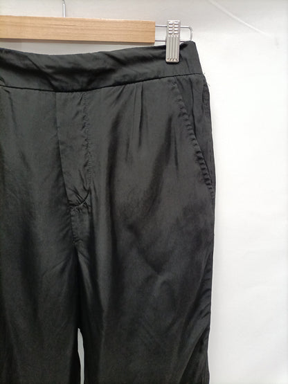 BIMBA Y LOLA. Black flowy trousers, size 36
