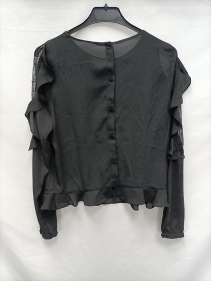 OTRAS. Blusa negra volante T.u(s)