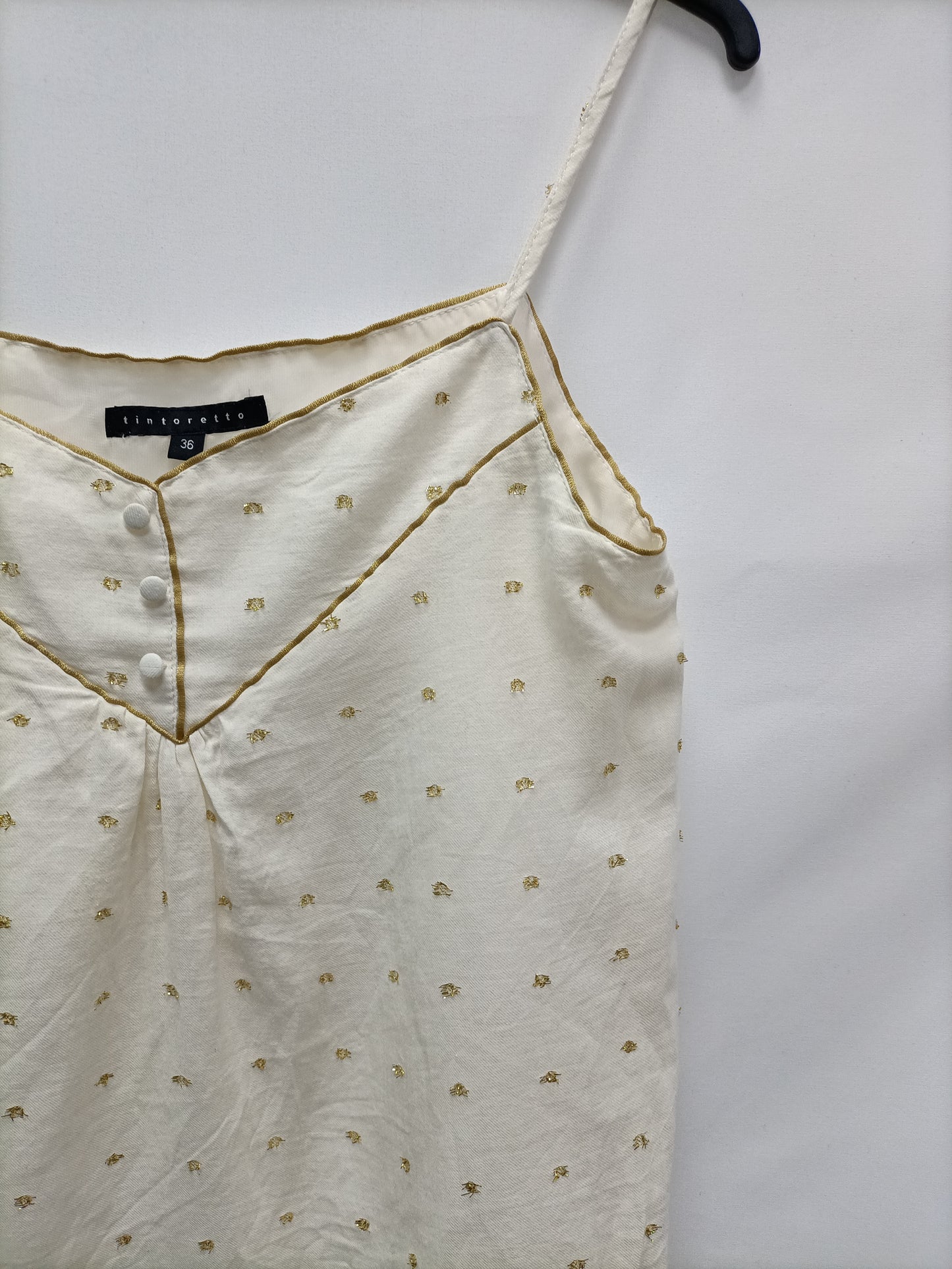 TINTORETTO. Blusa plumeti dorado T.36