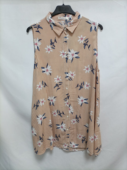 BEAUTY COLLECTION. Blusa flores y rayas T.l