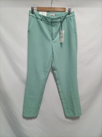 STRADIVARIUS. Pantalón chino verde agua T.38