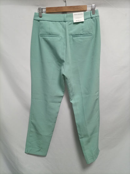 STRADIVARIUS. Pantalón chino verde agua T.38