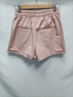 BERSHKA. Shorts rosas T.s