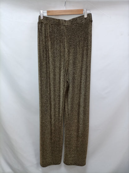 A PIE DE CALLE . Pantalón palazzo dorado T.m/l
