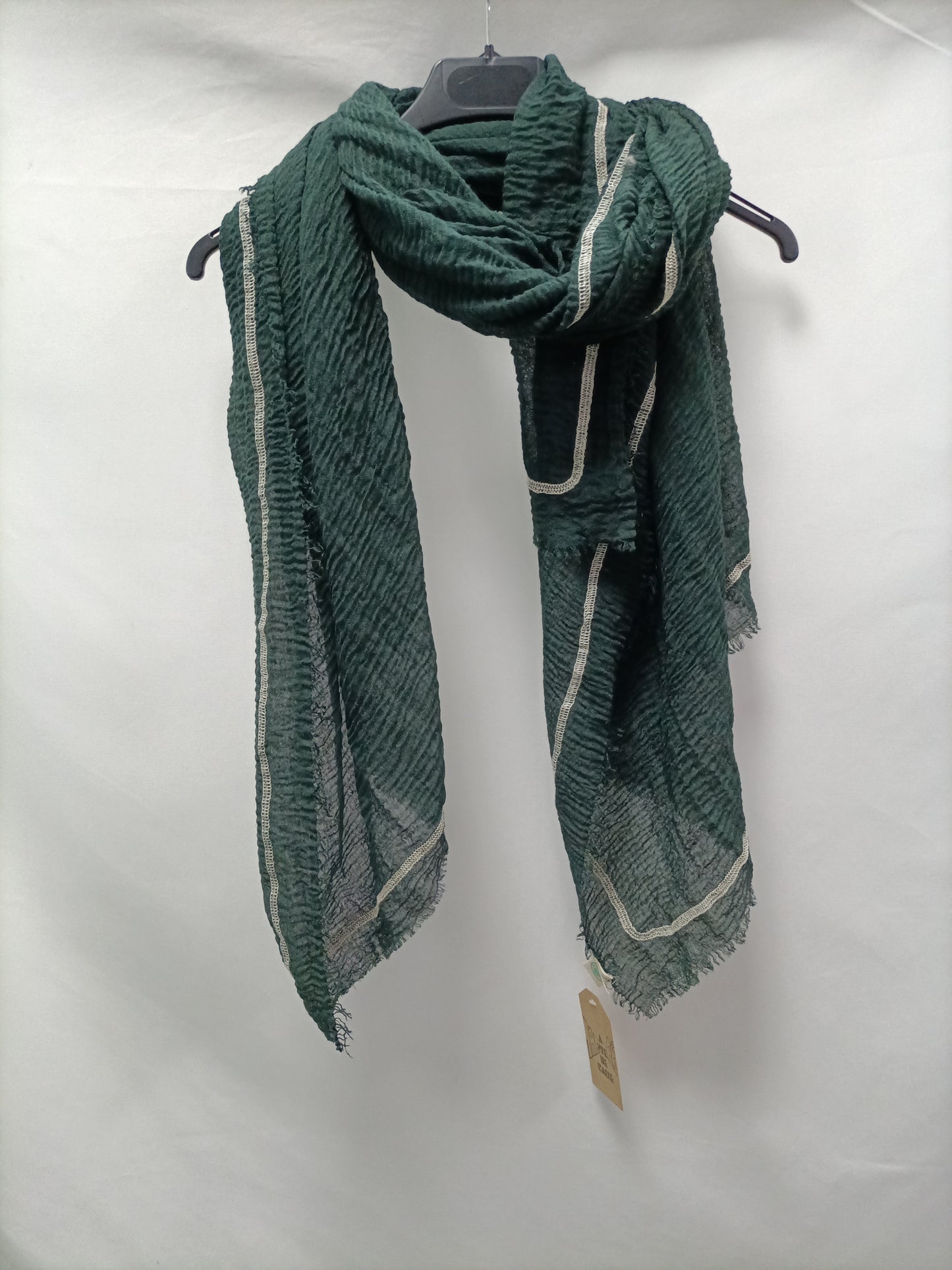 STREET LEVEL. Flowing green scarf