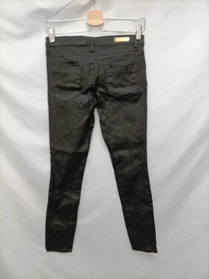 MASSIMO DUTTI. Black waxed trousers, size 36