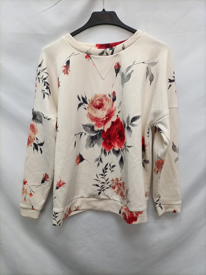 ZARA. Sudadera beige flores T.m