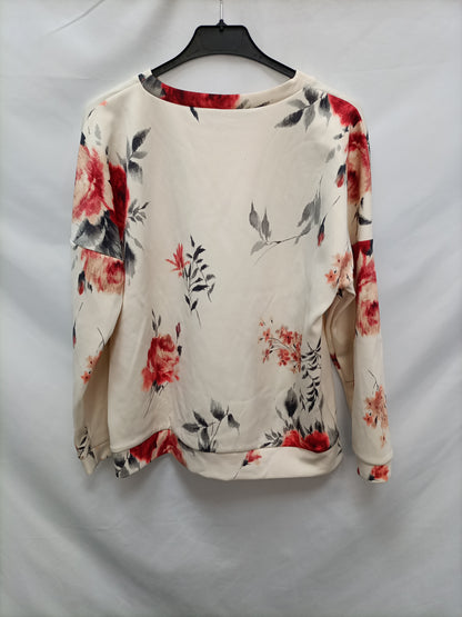 ZARA. Sudadera beige flores T.m