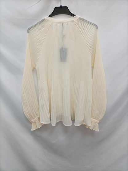 PEPE JEANS. Blusa beige plisada T.s
