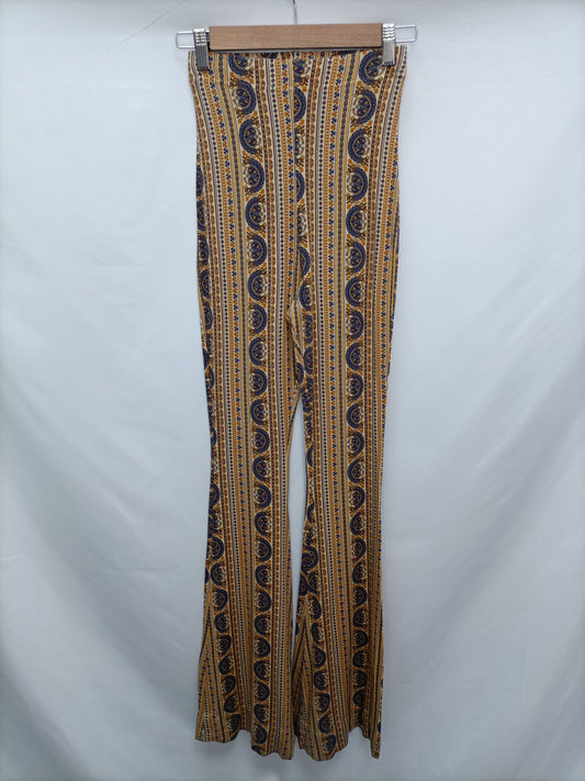 OTRAS.  Pantalón estampado campana T.s