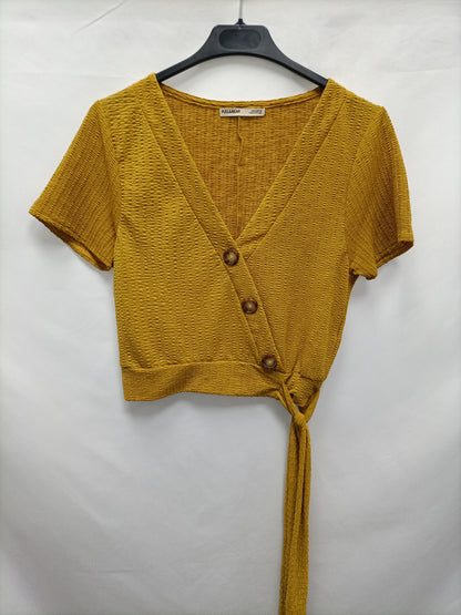 PULL&BEAR. Top cruzado botones T.s