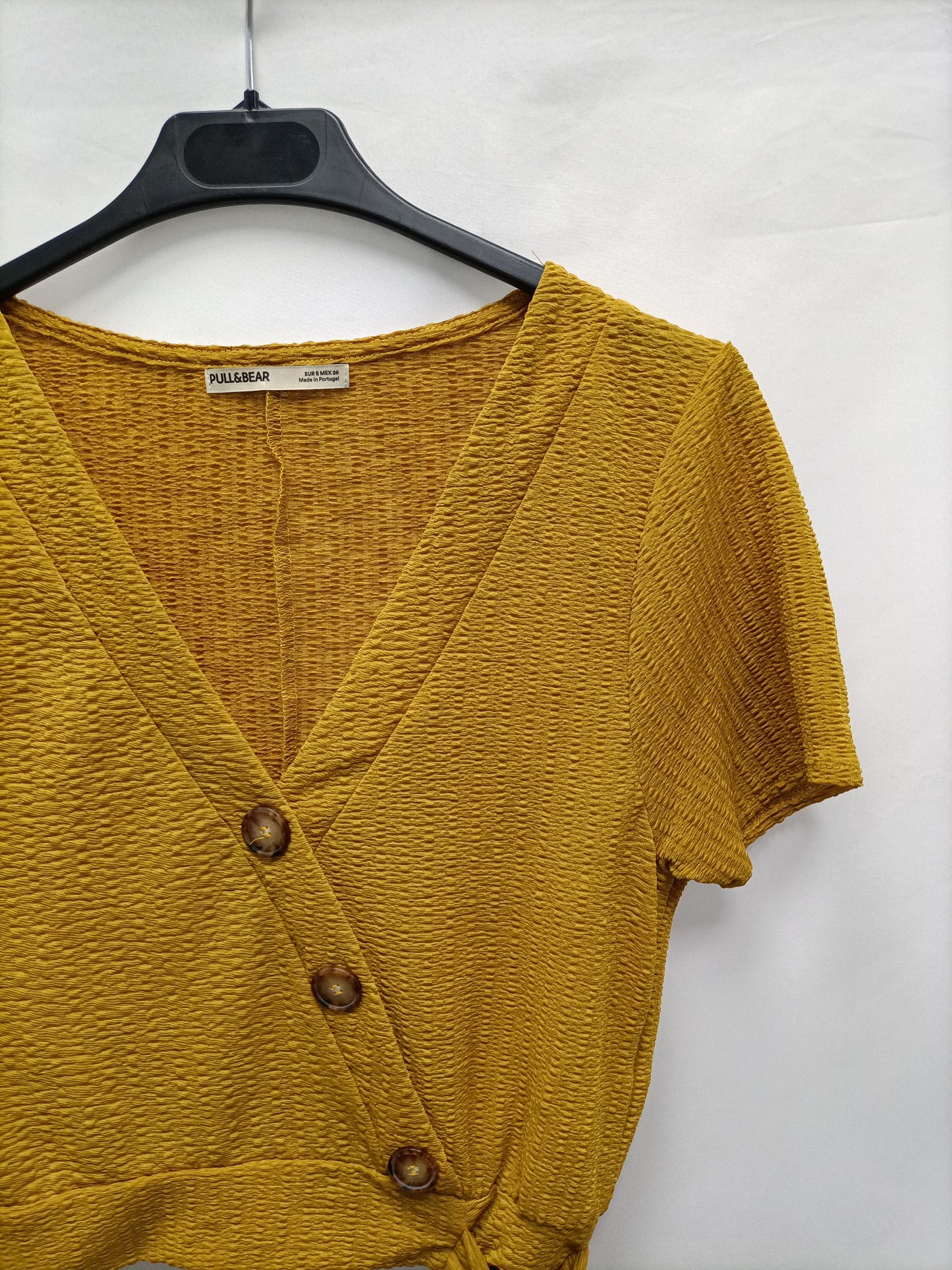 PULL&BEAR. Top cruzado botones T.s