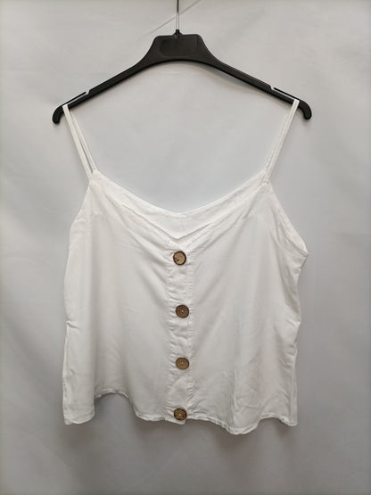 OTRAS. Top blanco botones T.u