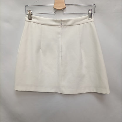 ZARA. Falda blanca cremallera T.s