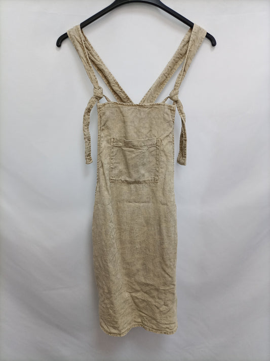 PULL& BEAR. Peto beige fluido T.s