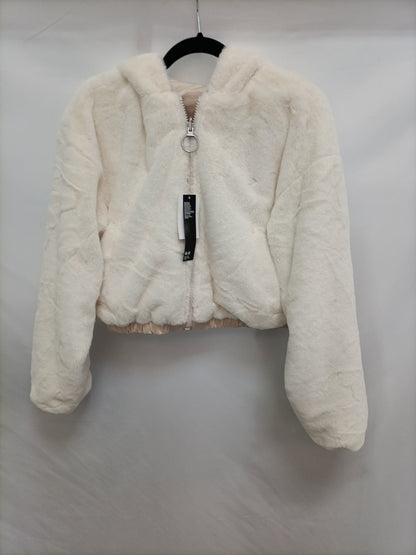 H&M. Abrigo corto reversible T.s