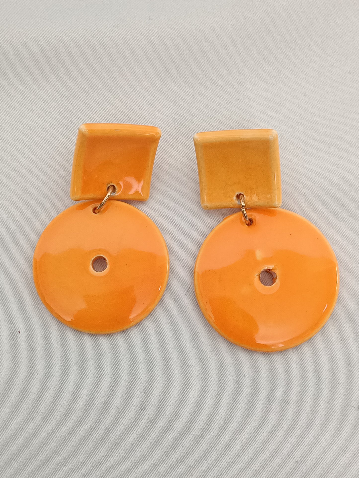 OTHERS. Orange earrings