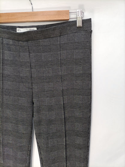 SFERA. Pantalón elástico cuadros T.l