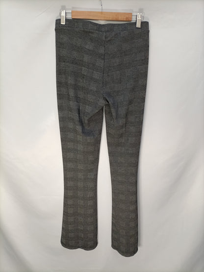 SFERA. Pantalón elástico cuadros T.l