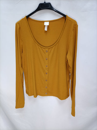 H&M. Camisetaostaza canalé  T.l