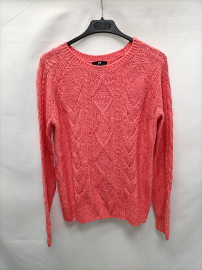 H&M. Jersey rosa ochos T.s