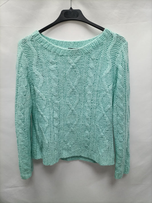 H&M. Jersey turquesa ochos T.s