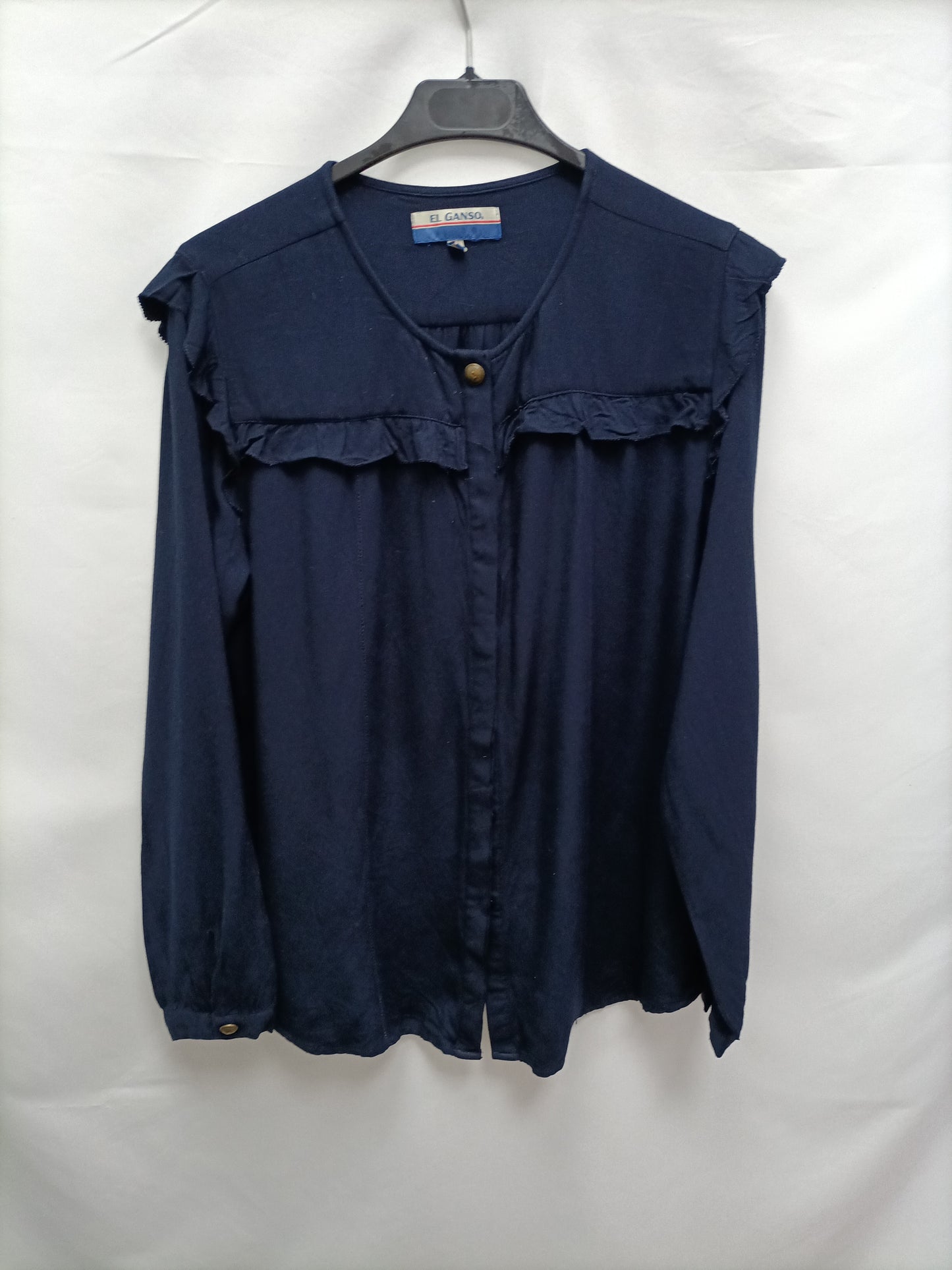THE GOOSE. Blue blouse with ruffles Tl