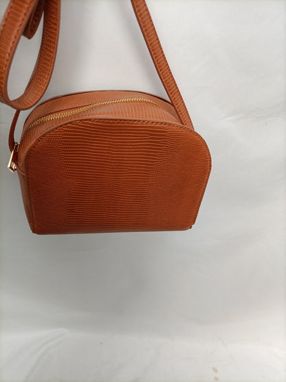 INEXTENSO. Camel snake bag