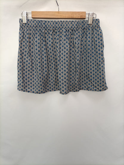 BROWNIE. Falda mini flores T.s