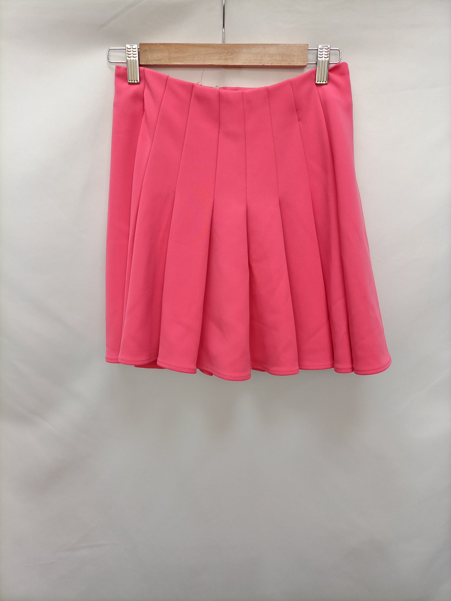 H&M. Falda tablas rosa T.36