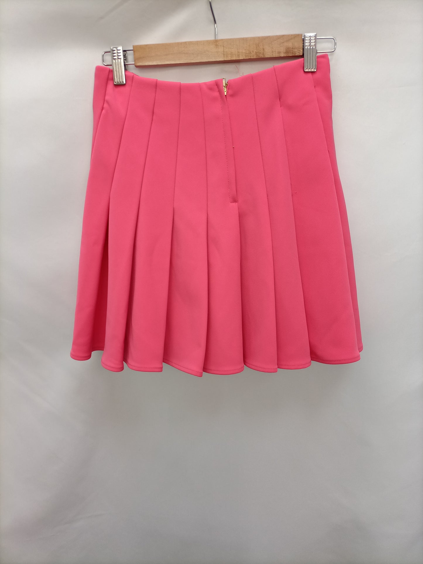 H&M. Falda tablas rosa T.36