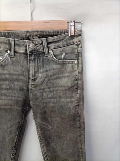 ZARA. Pantalón gris desgastado T.36
