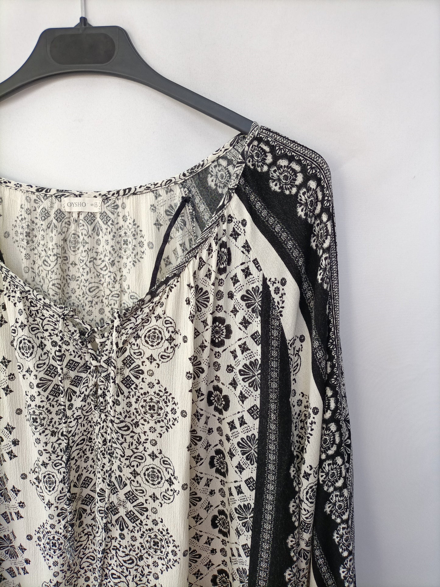 OYSHO. Blusa fluida flores T.s