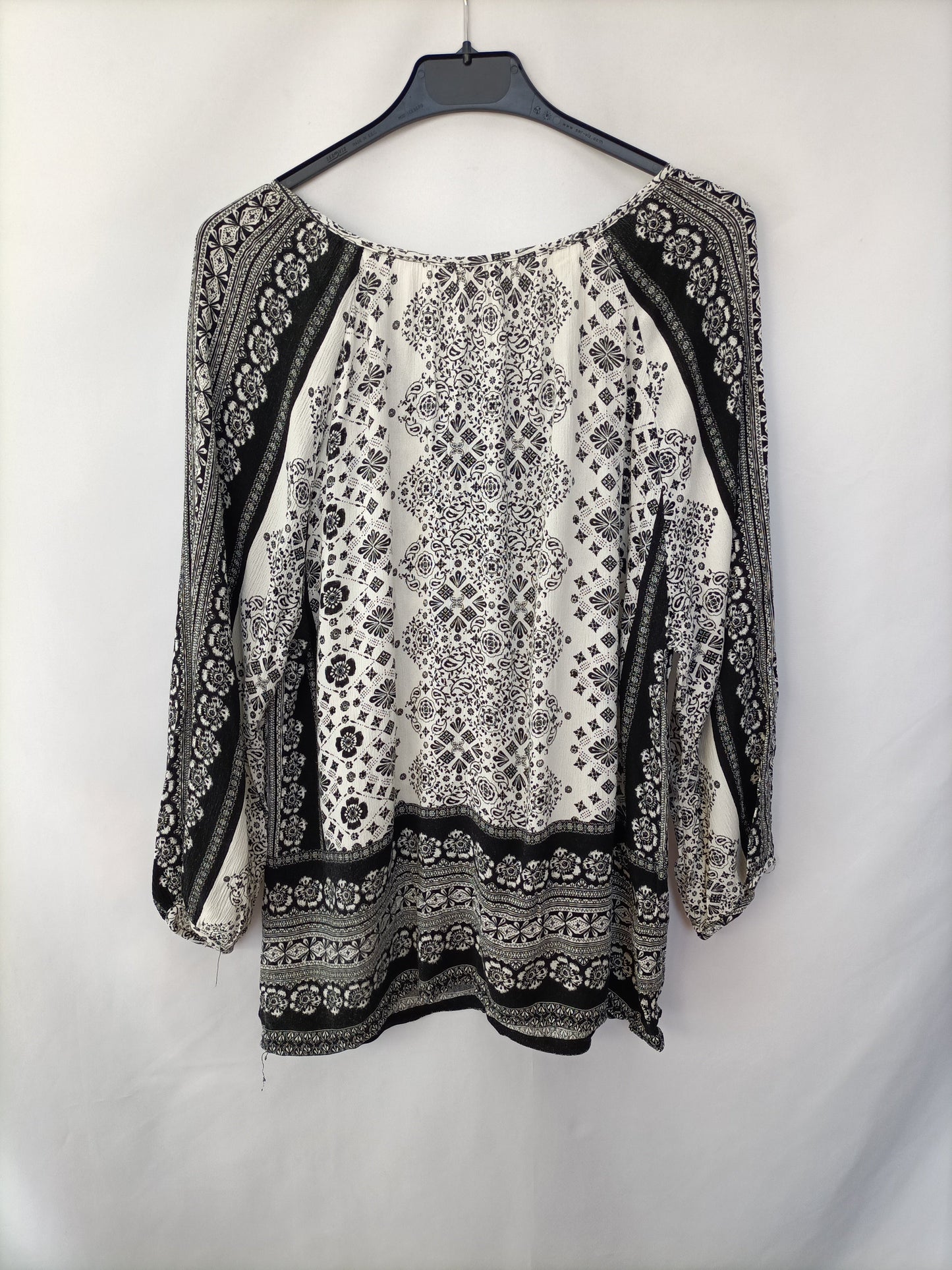 OYSHO. Blusa fluida flores T.s