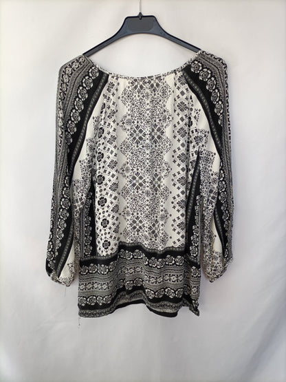 OYSHO. Blusa fluida flores T.s