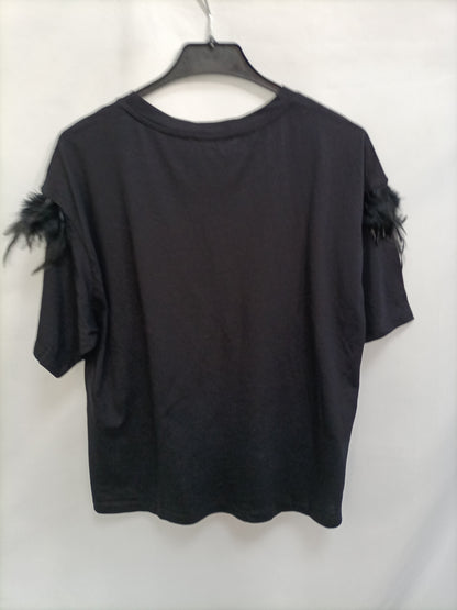 MANGO. Camiseta mangas plumas T.m