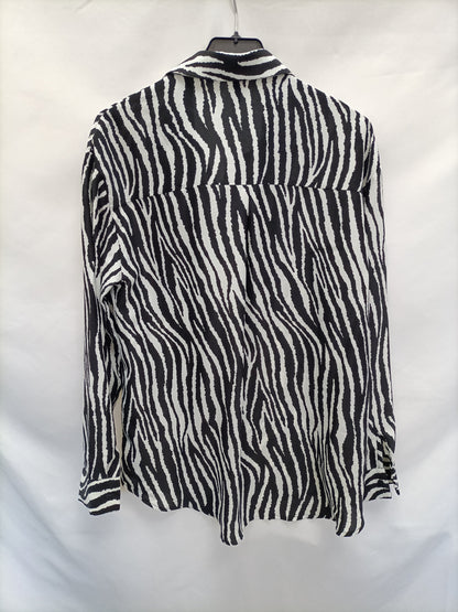 MORANGO. Blusa fluida cebraT.s