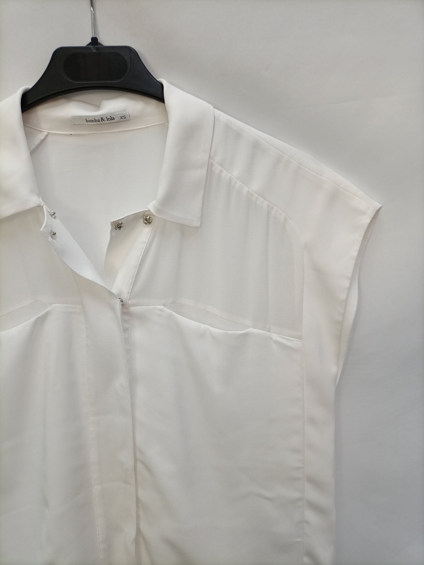 BIMBA Y LOLA. Blusa sin mangas T.xs