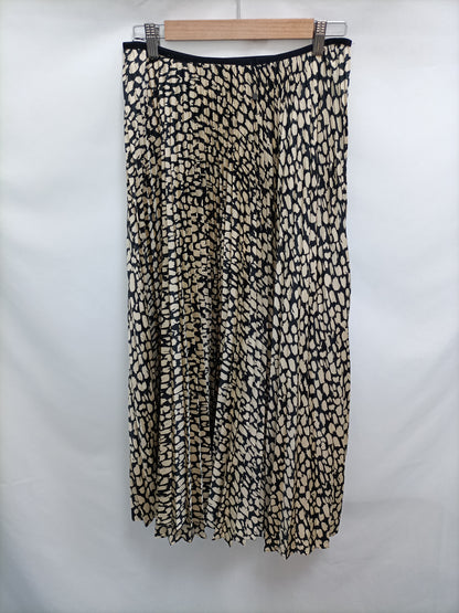 MAMGO. Falda plisada estampada T.L