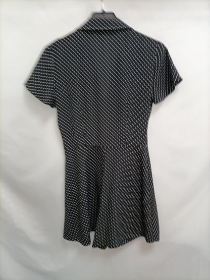 ZARA. Mono negro lunares T.xs