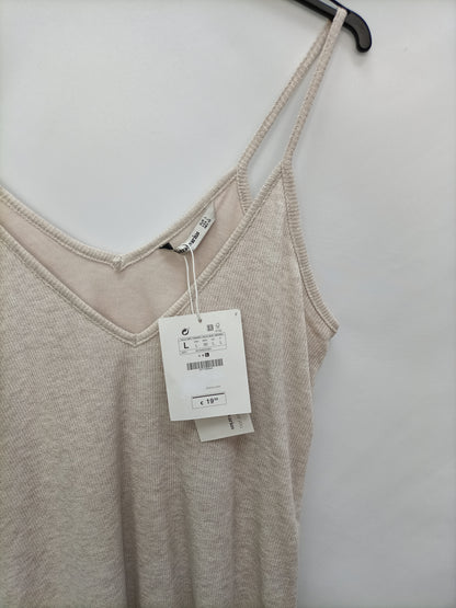 STRADIVARIUS. Vestido midi beige T.l