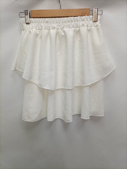 OTRAS. Falda blanca volantes T.U (S)