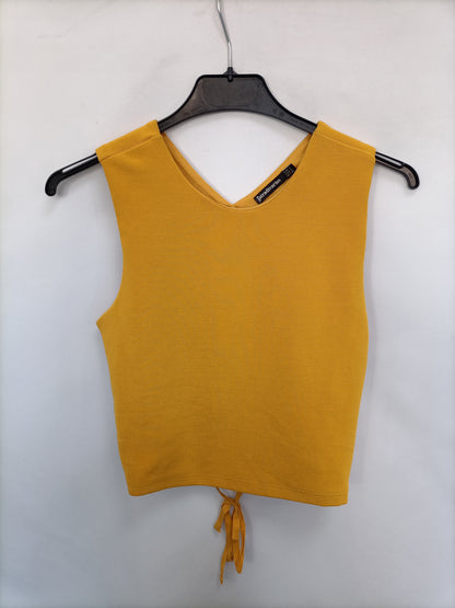 STRADIVARIUS. Top mostaza cuerdas T.s