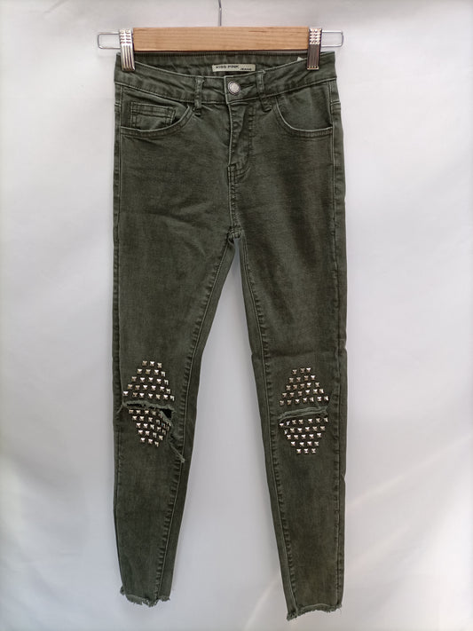 KISS PINK. Green jeans with studs T.xs