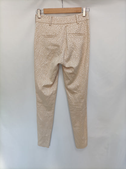 INTROPIA. Animal print embroidered trousers, size 34